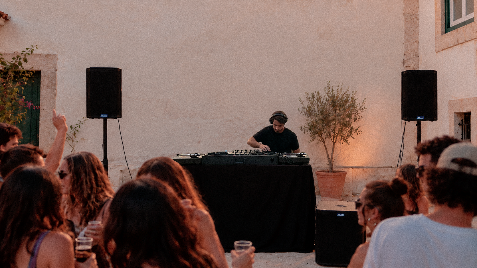 SLOONK DJ set at an outdoor garden party in Lisbon